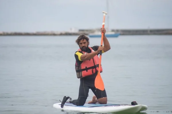paddle board athlete turn